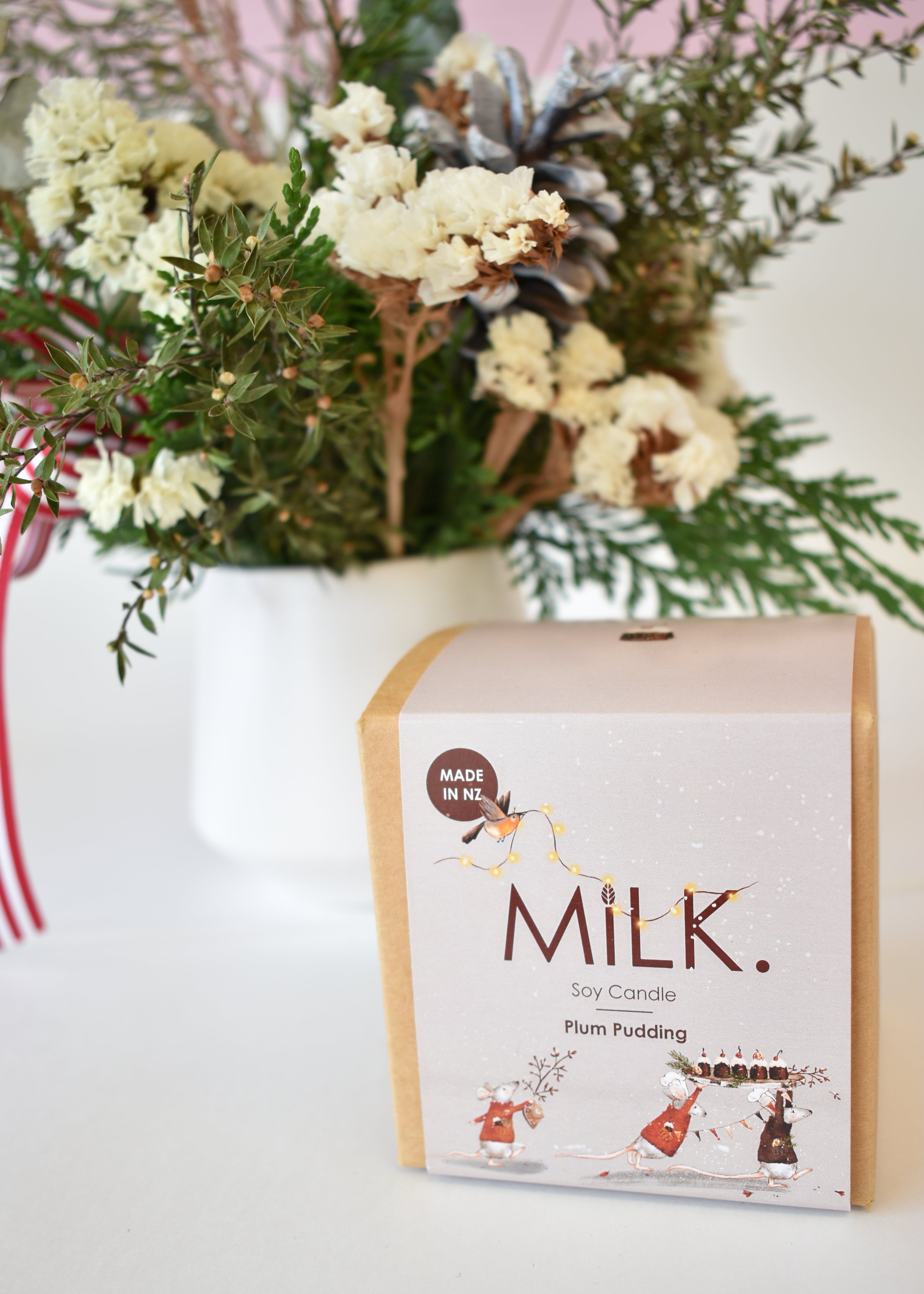 Plum Pudding Christmas Candle with dried flower arrangement