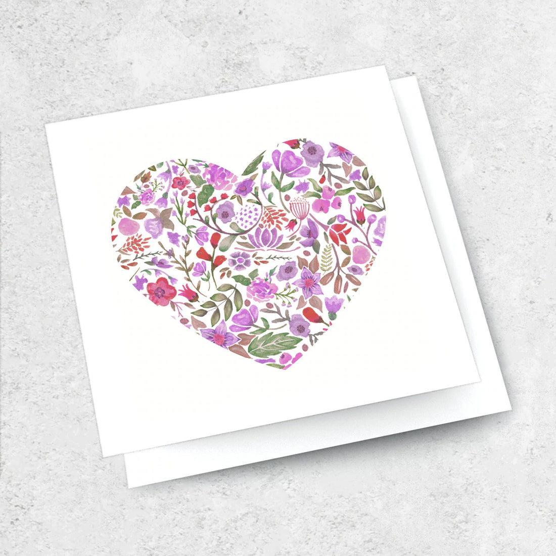 White greeting card with floral purple painted love heart