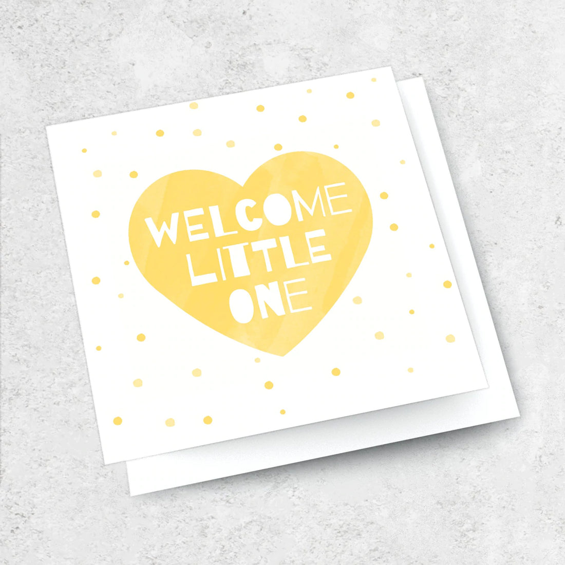 Greeting card with yellow heart to welcome a new baby