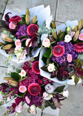 Seasonal Bouquet ‘Berry’ — a hand-tied mix of pink, purple, and red seasonal flowers, available for Christchurch flower delivery.
