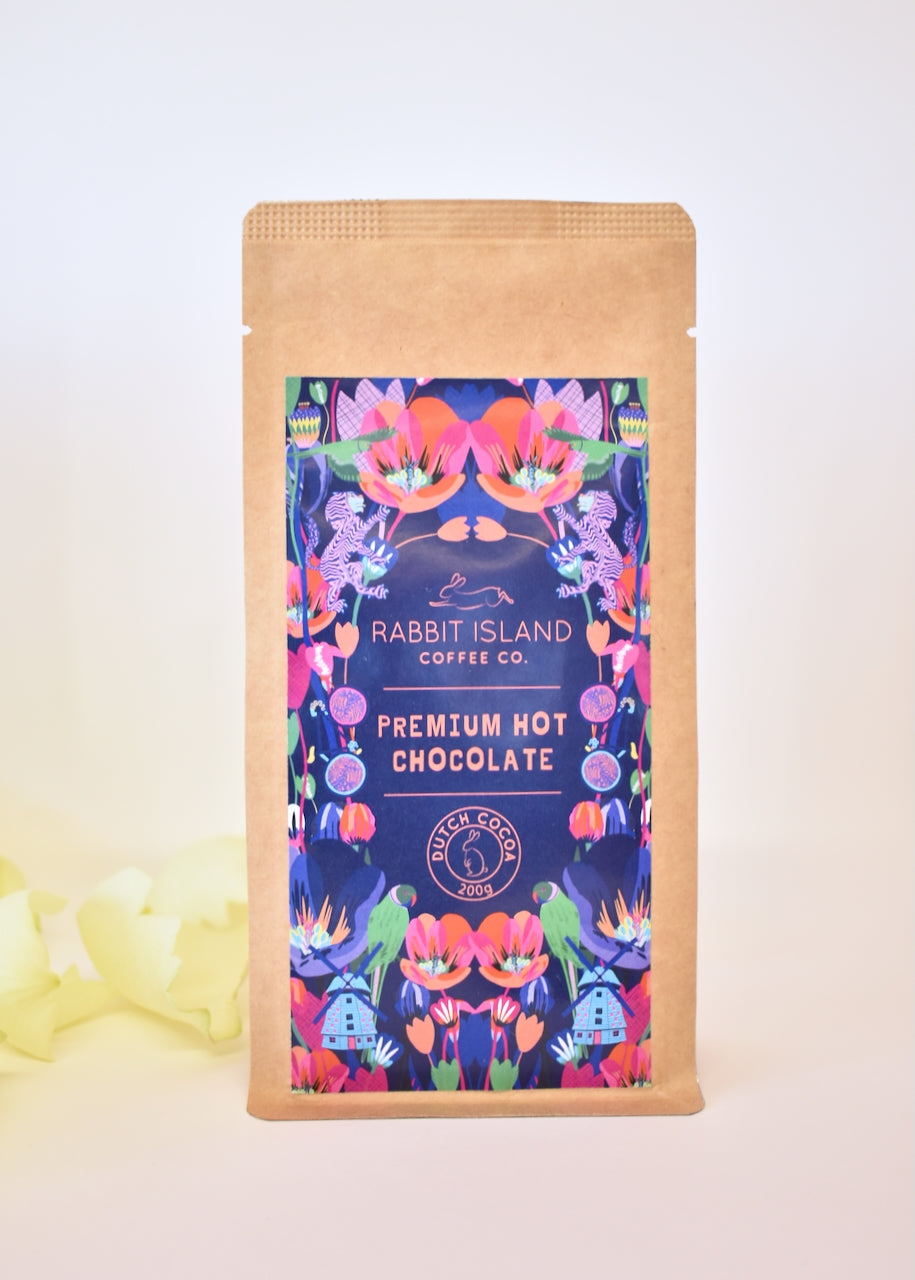 200gram bag of drinking chocolate mix. Pretty pink and purple label.