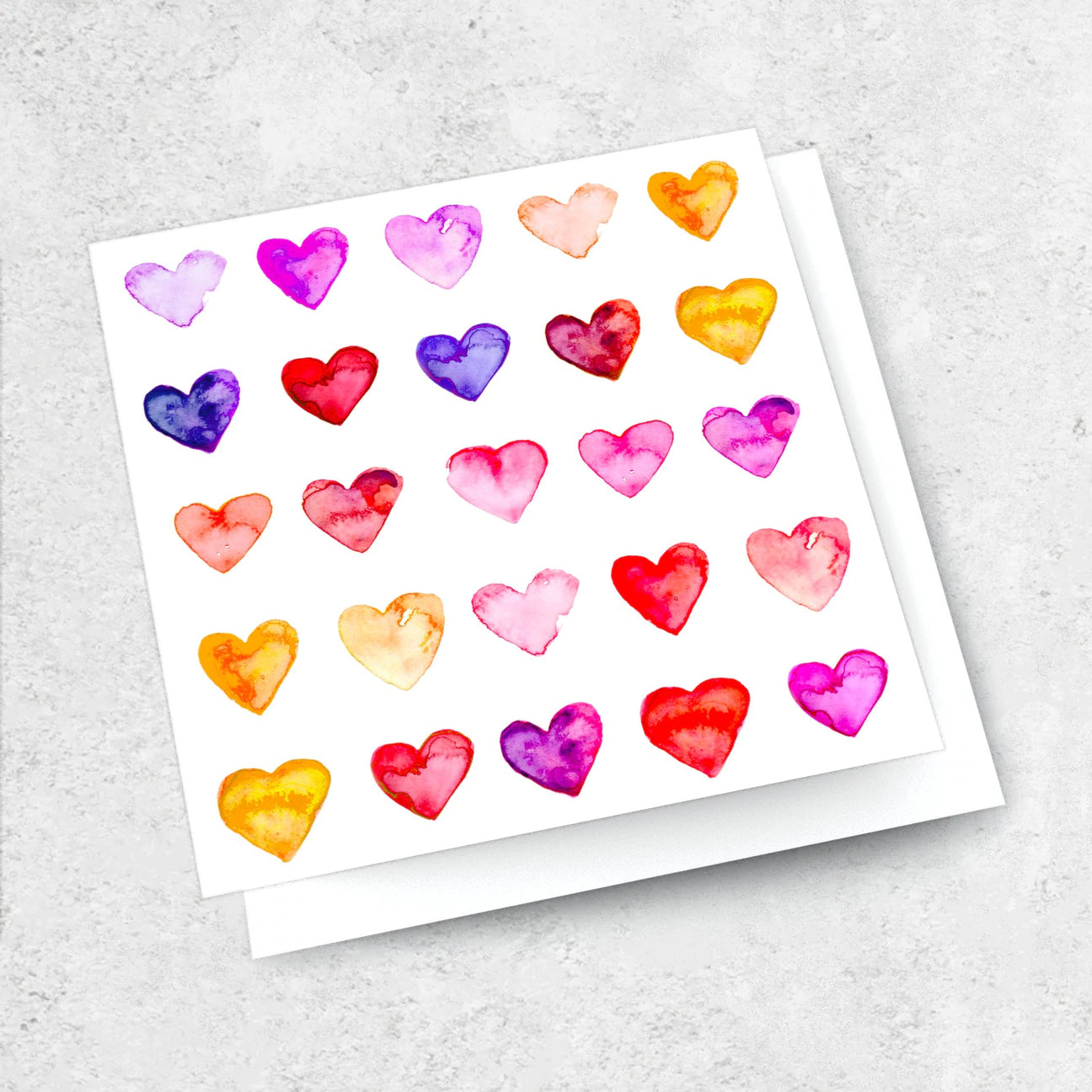 Greeting card with rows of small colourful love hearts