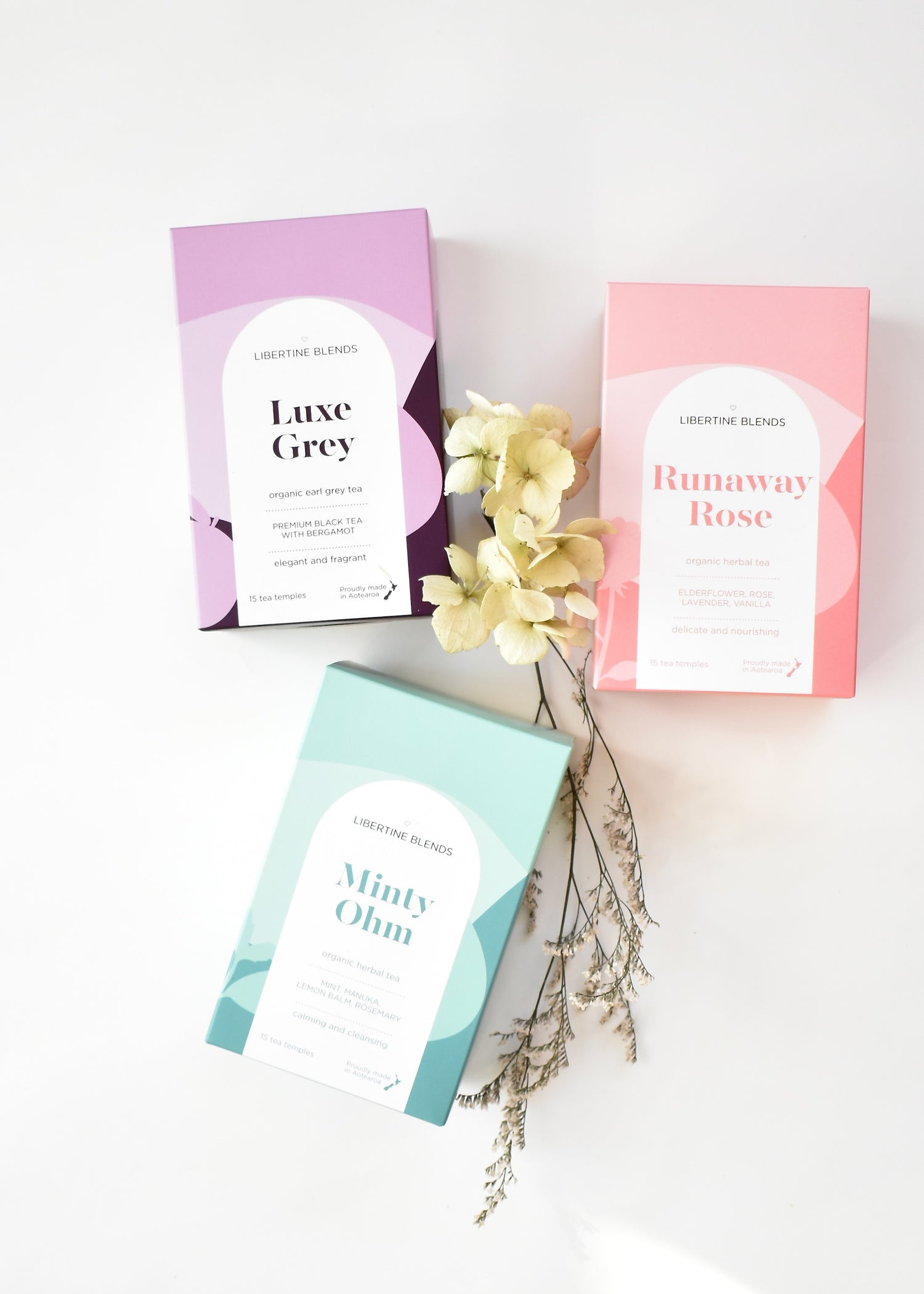 Three boxes of hebal tea in flat lay&gt; Mint, rose and luxe Grey