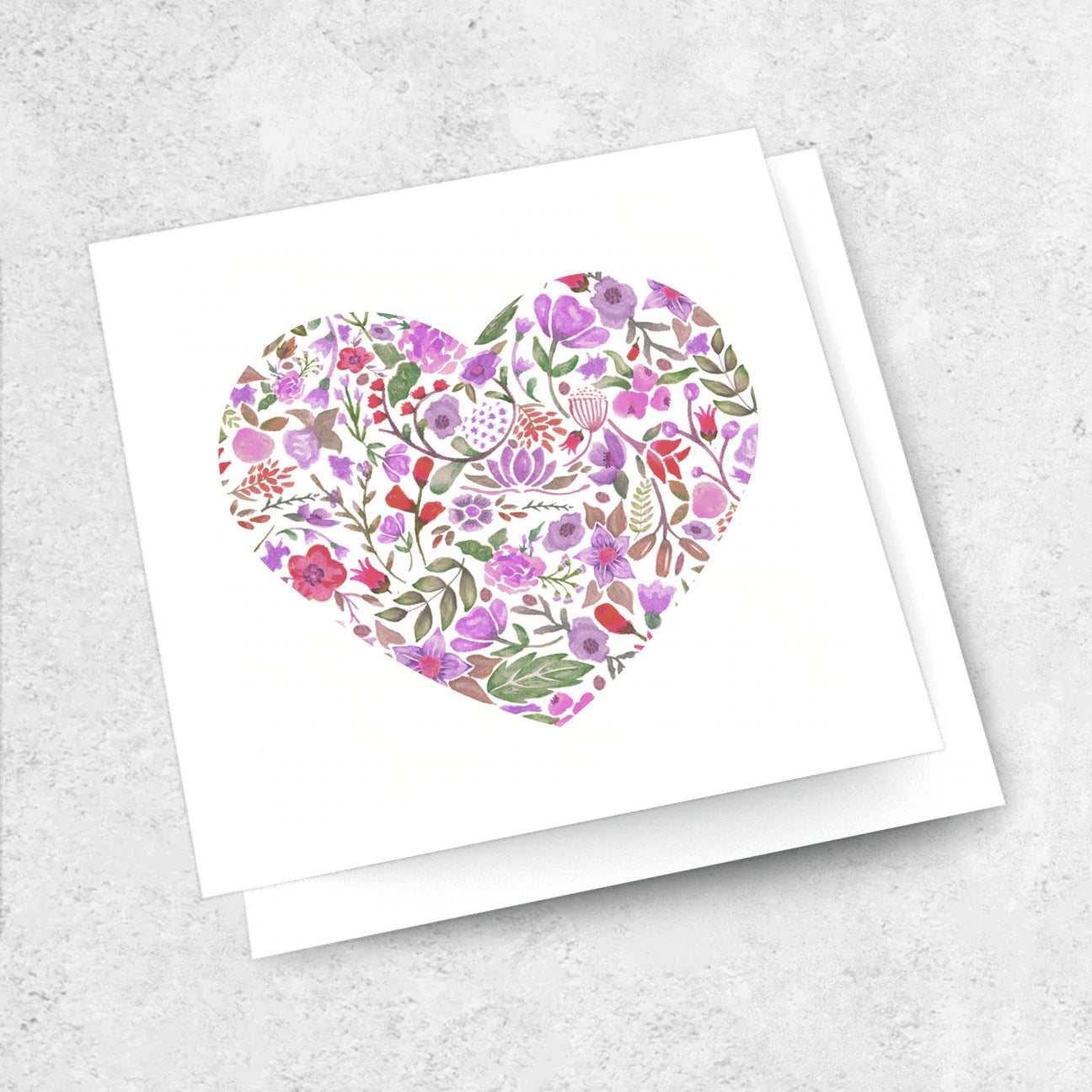 White greeting card with floral purple painted love heart
