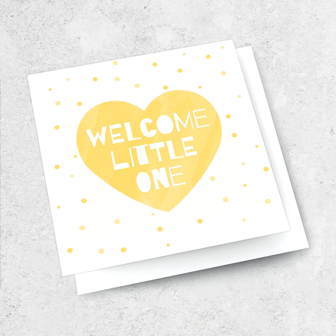 Greeting card with yellow heart to welcome a new baby